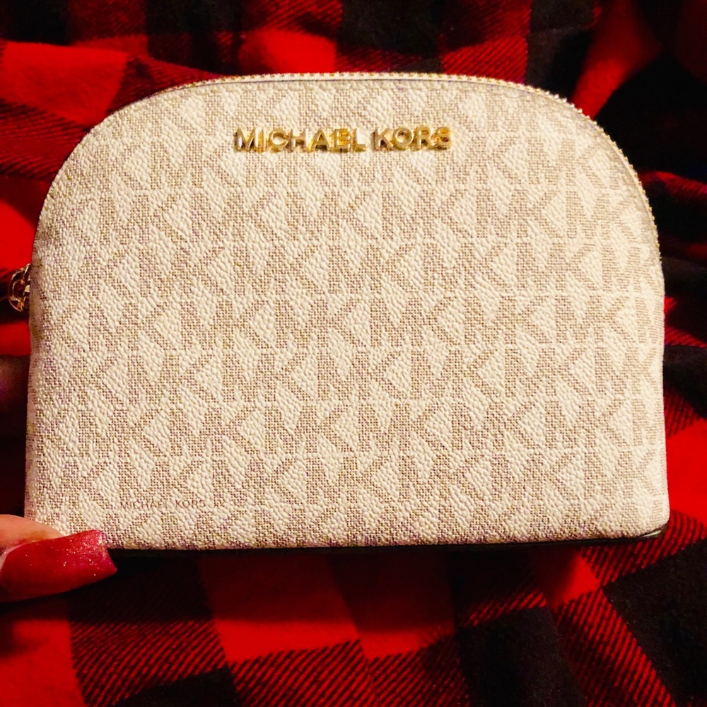 Authentic MK Lg Hand held Travel Pouch